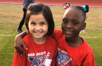  Two students standing side by side