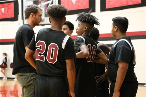 boys basketball huddle