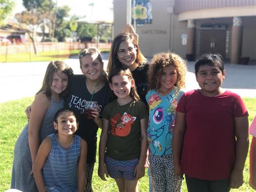 happy group of children and adults