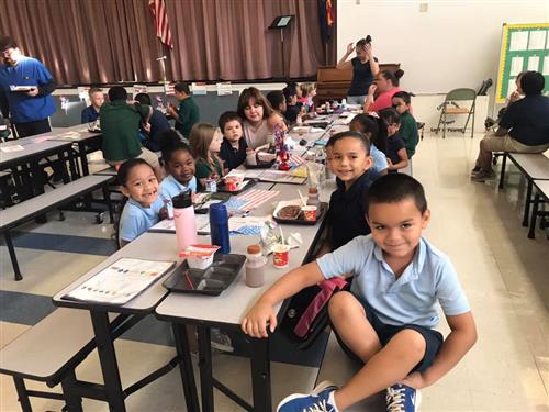 students sit at lunch