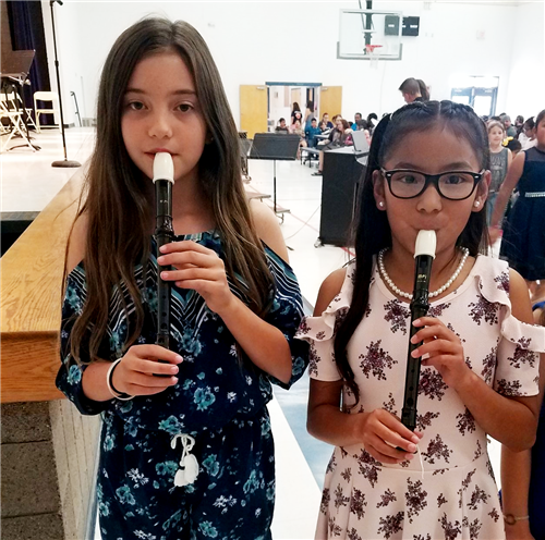 students play the recorder