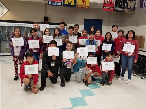 students hold certificates