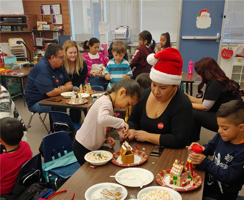 a parent visits a classroom for an activity